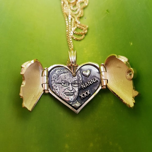 Feathered Heart locket in 9k yellow gold