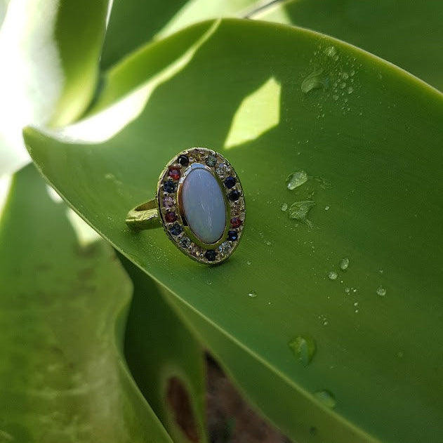 Opal, diamond and sapphire ring