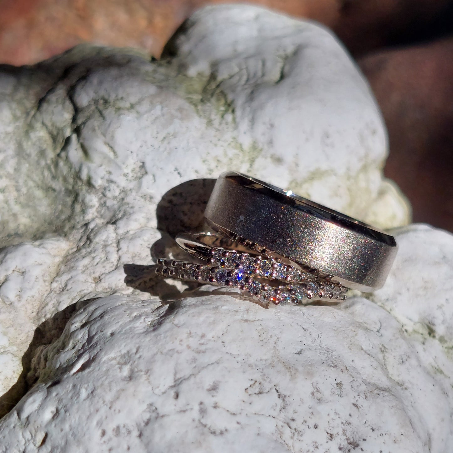 White gold wedders his and hers with diamonds
