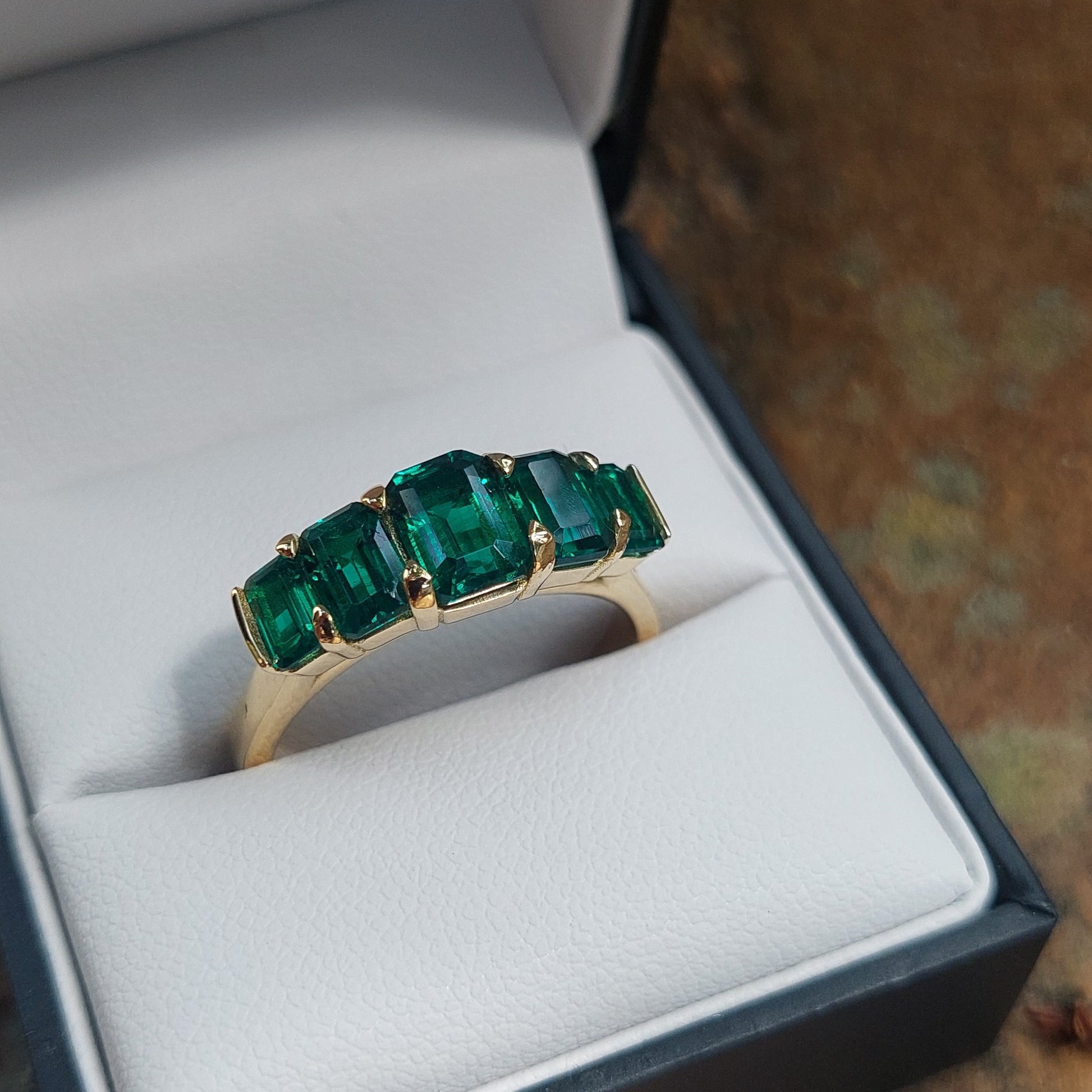 Emerald dress ring
