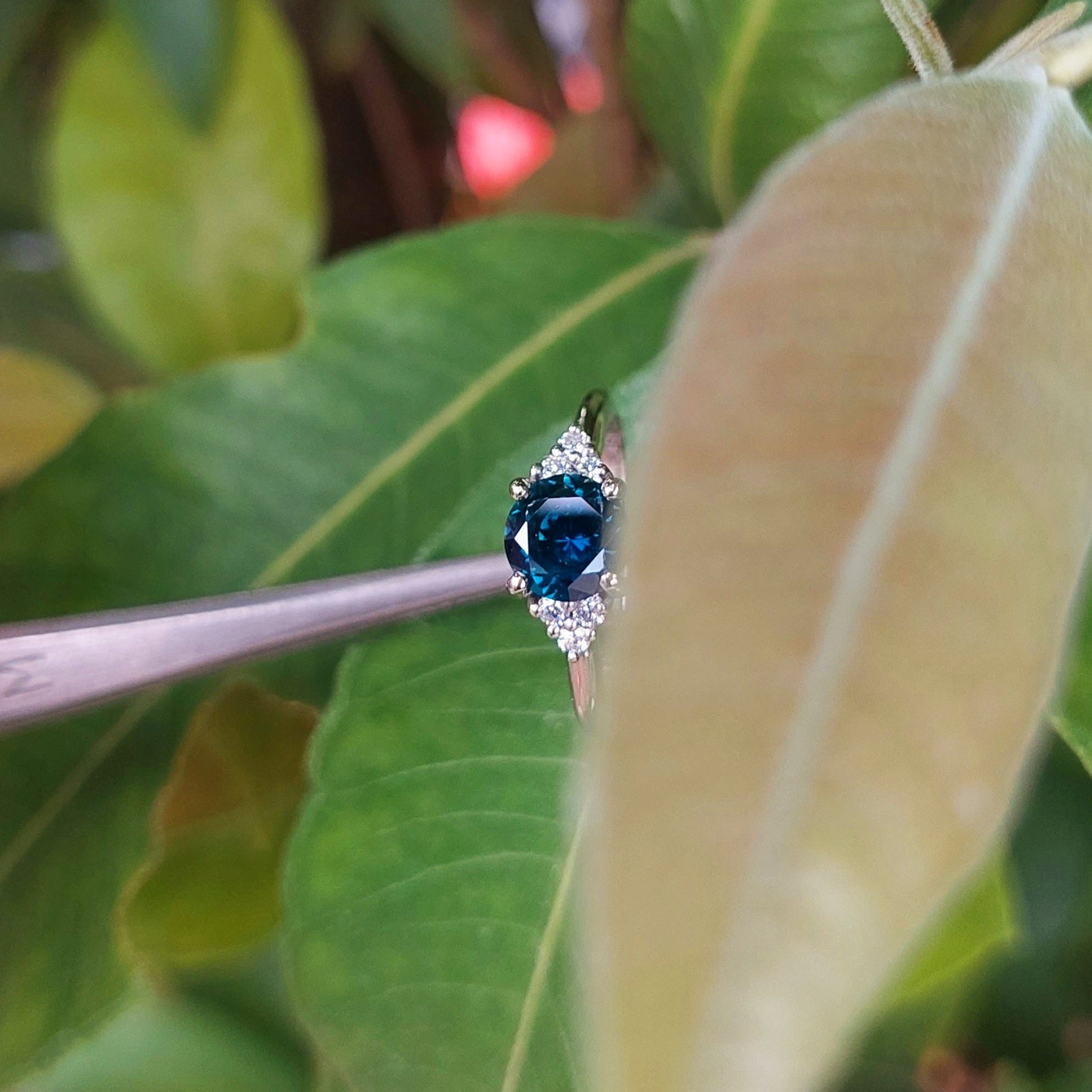 Australian blue Sapphire and diamond engagement ring