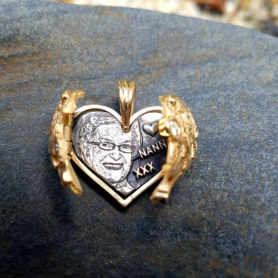 Heart locket keepsake in gold